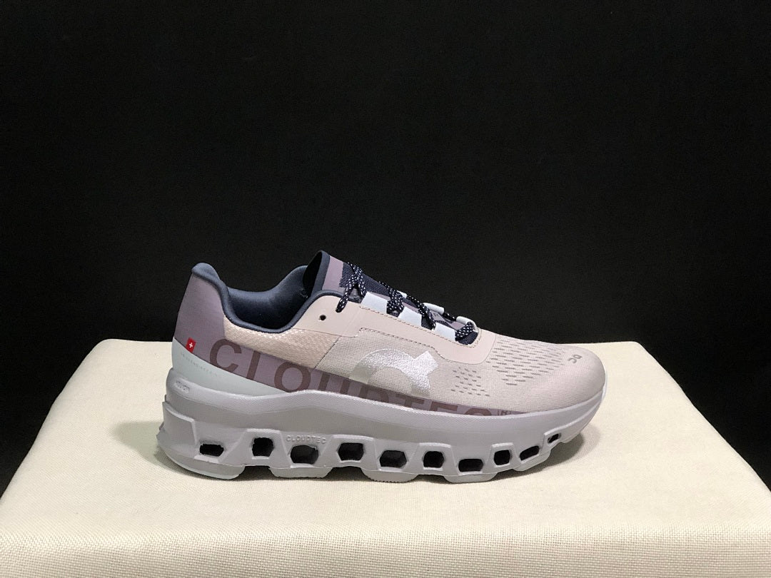 On Cloudmonster Sneakers in Gray and Purple
