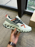 On Cloudhorizon Trail Sneakers in Cream, Gray and Red