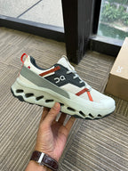 On Cloudhorizon Trail Sneakers in Cream, Gray and Red