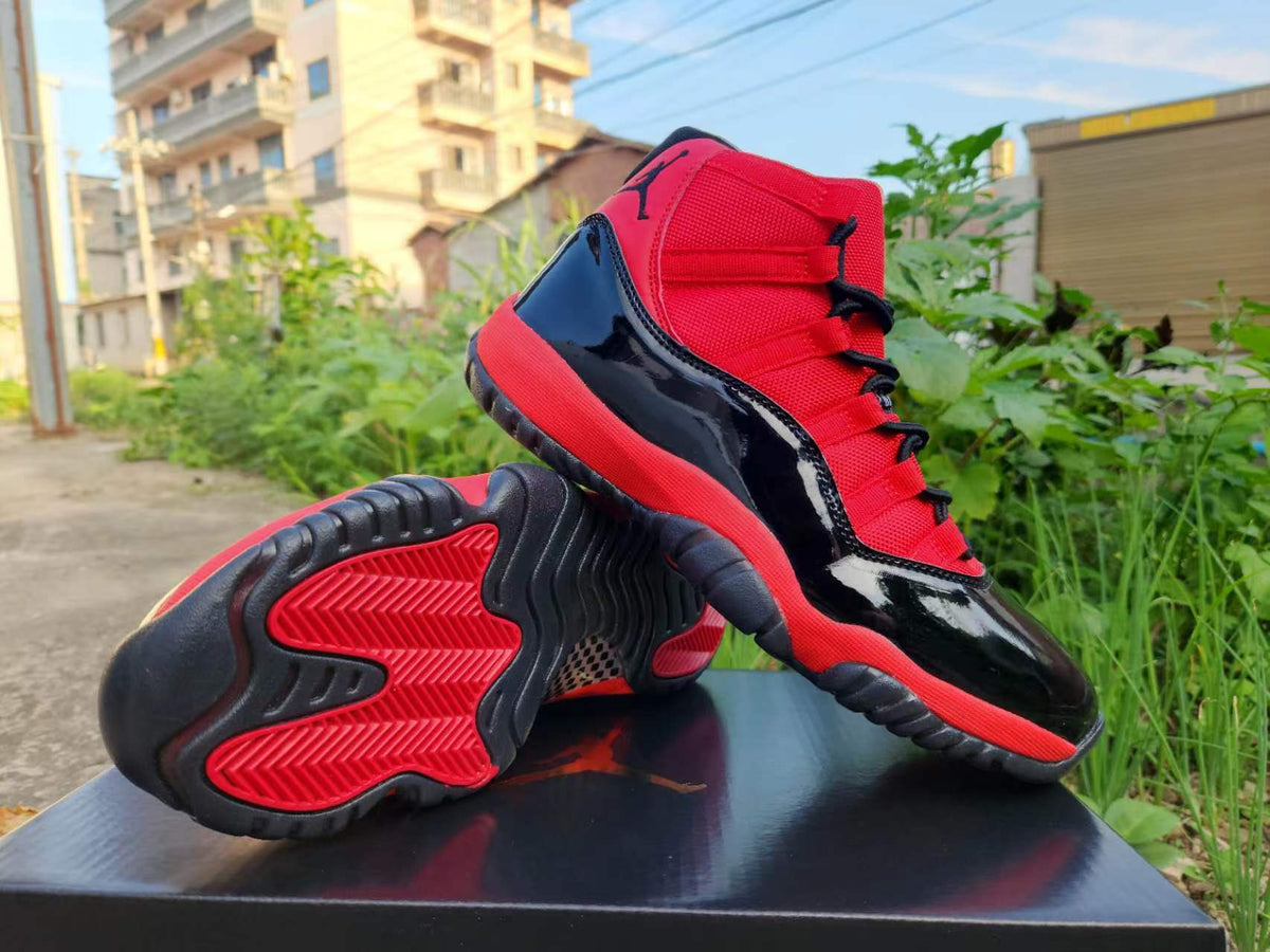 Jordan 11 Red and Black High-Top Sneakers
