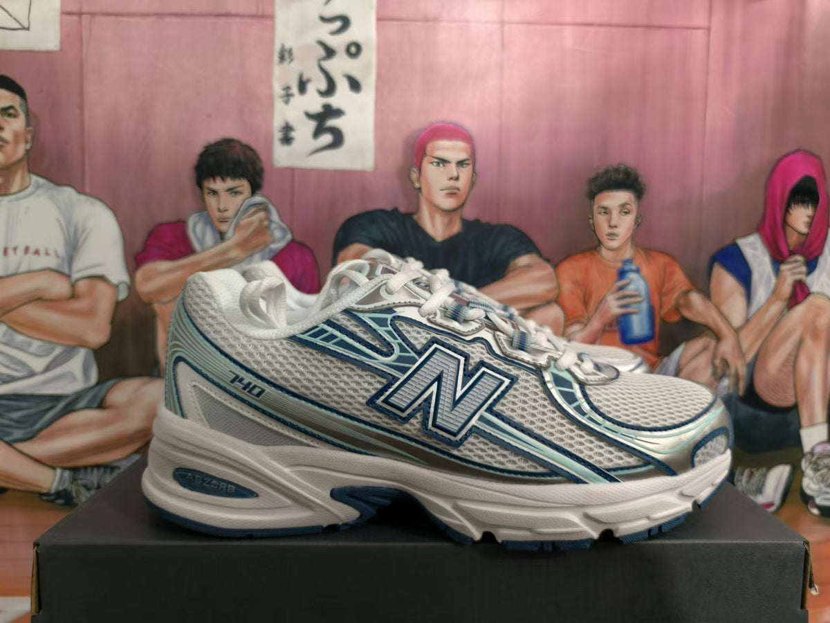 New Balance 740 White and Blue Sneakers