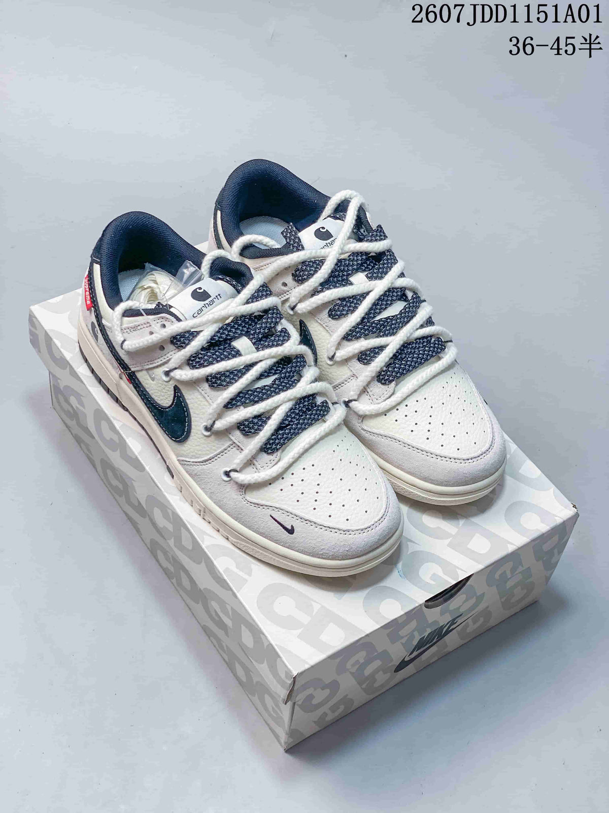Nike SB Dunk Low x Carhartt White and Navy Sneakers