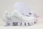 Nike Shox TL Sneakers in Black and Gold