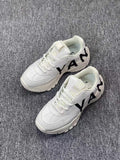 White Chunky Low-Top Sneakers with Black Side Graphics