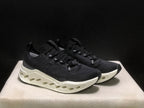 On Cloudsurfer Max Black and White Running Sneakers