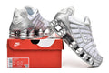 Nike Shox TL Sneakers in White and Metallic Silver