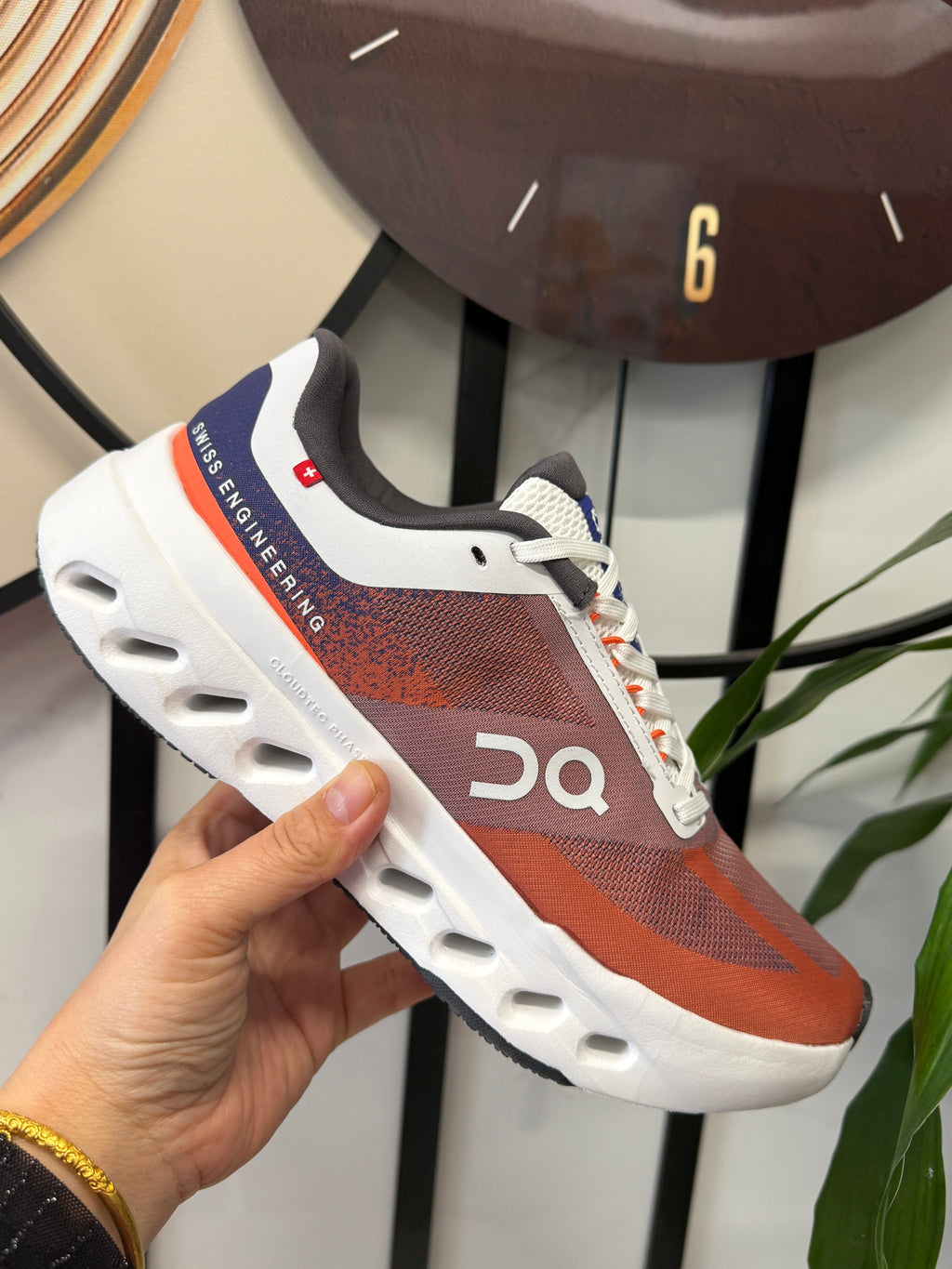 On Cloudsurfer Running Shoes in Rust and White