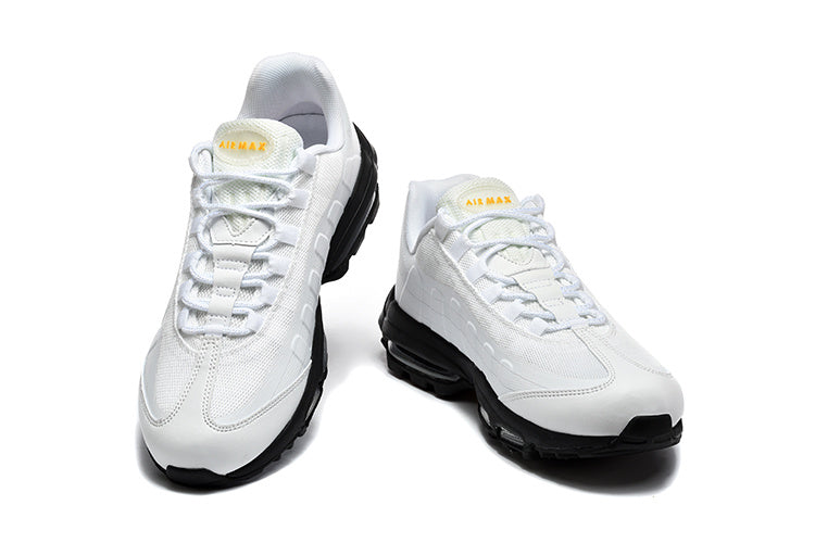 Nike Air Max White and Black Sneakers with Orange Swoosh