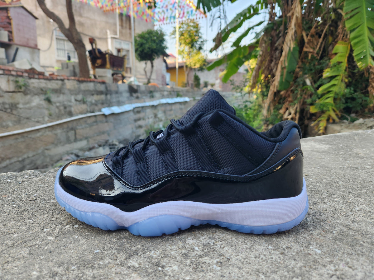 Air Jordan 11 Low Black and White Sneakers