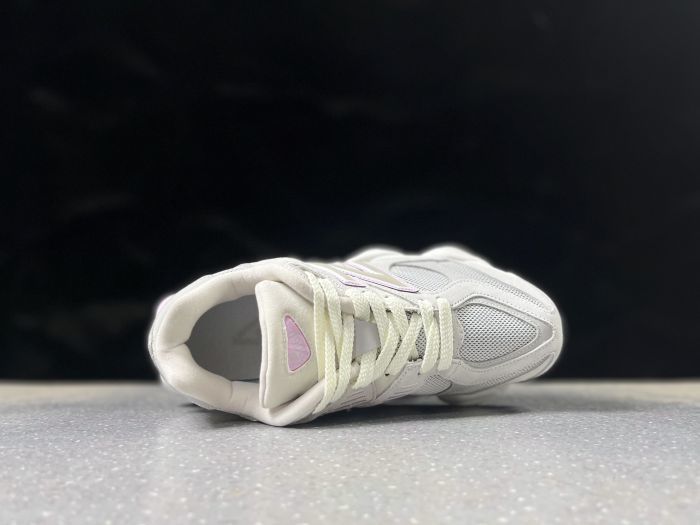 New Balance 9060 U9060ZGE Sneakers in White and Pink