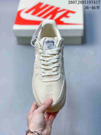 Stussy x Nike Air Force 1 '07 Cream Woven Sneakers