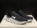 On Cloudmonster Black and White Running Sneakers