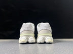 New Balance U9060ERB Sneakers in White and Pale Yellow