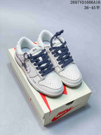 Nike SB Dunk Low White Gray Monogram-Style Sneakers