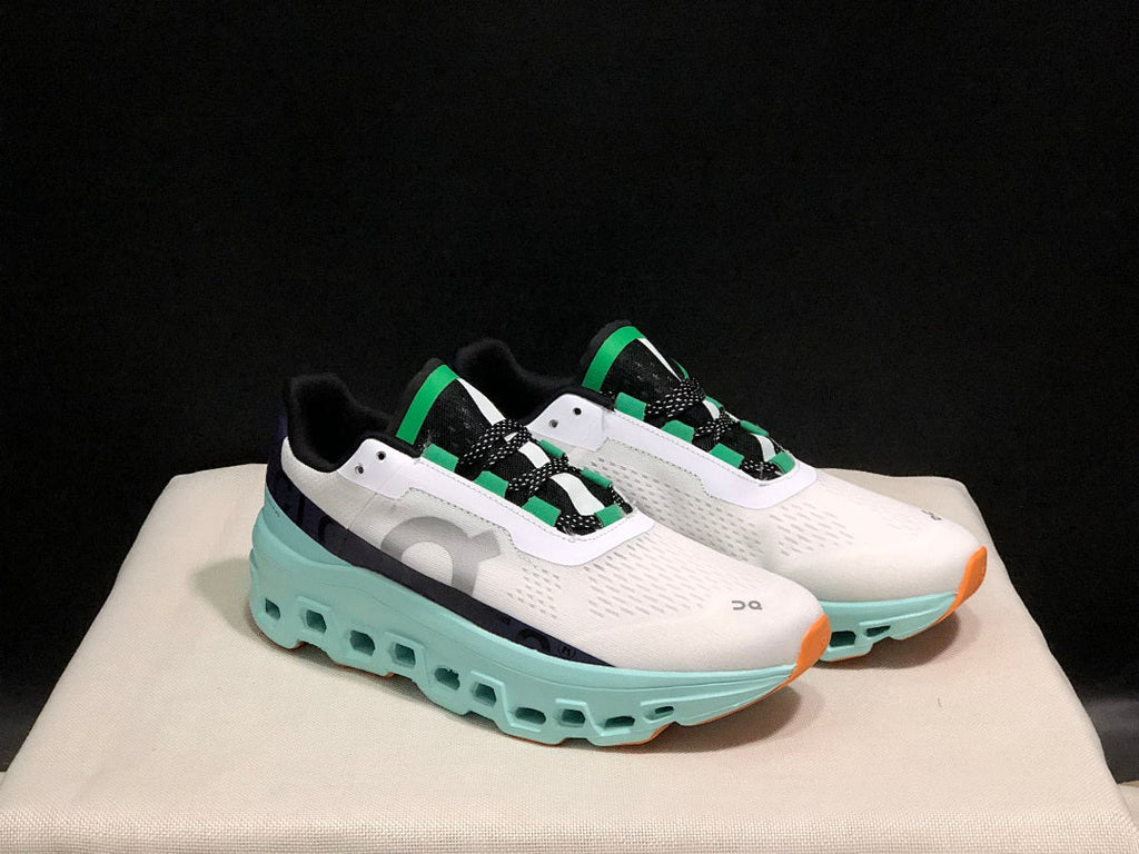 On Cloudmonster Running Shoes in White and Aqua