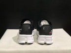 On Cloudmonster Black and White Running Sneakers