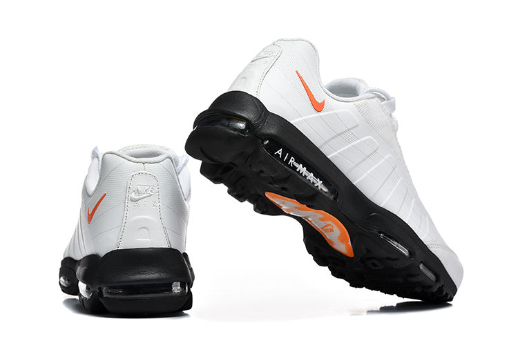 Nike Air Max White and Black Sneakers with Orange Swoosh