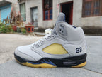 Air Jordan 5 High-Top Sneakers in Black and Yellow