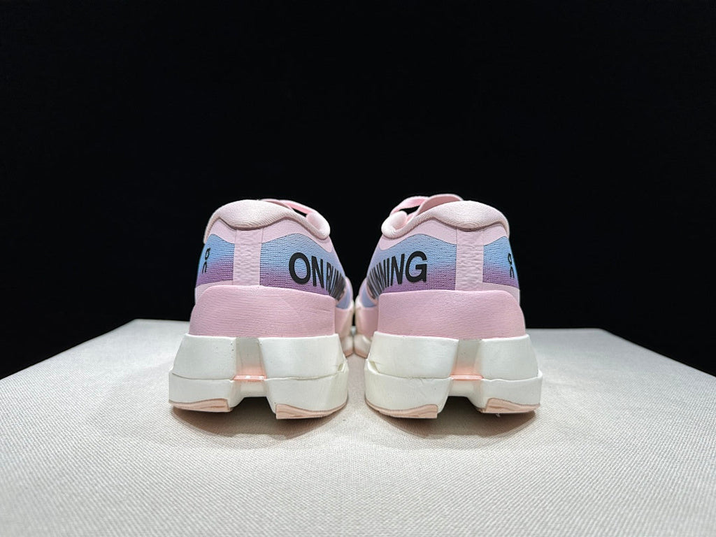 On Cloudboom Max Running Shoes in Pink and Blue